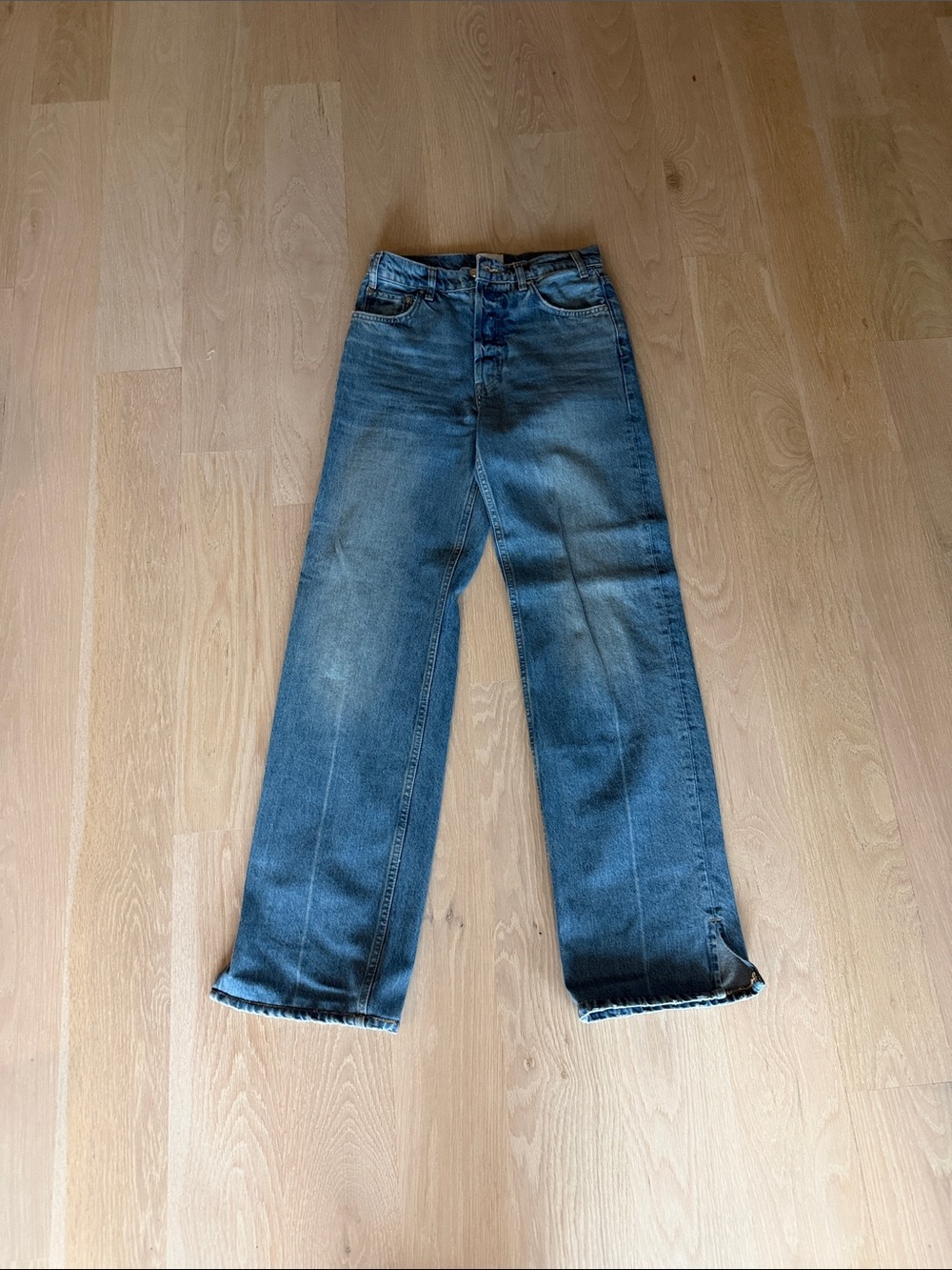 Anine Bing women’s Relaxed Wide-Leg Jeans in Blue Wash with side slit
